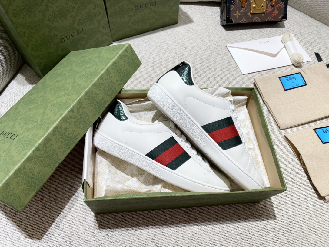 G*u*i sneakers