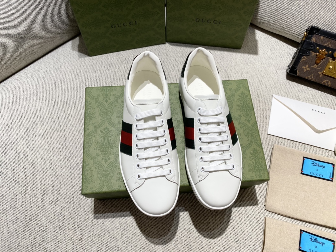 G*u*i sneakers