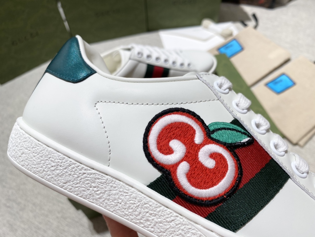 G*u*i sneakers