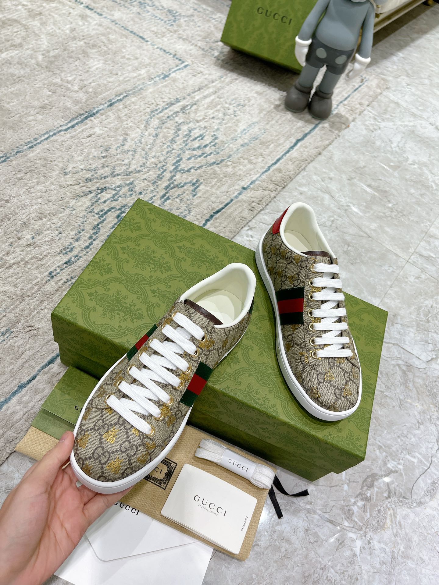 G*u*i sneakers