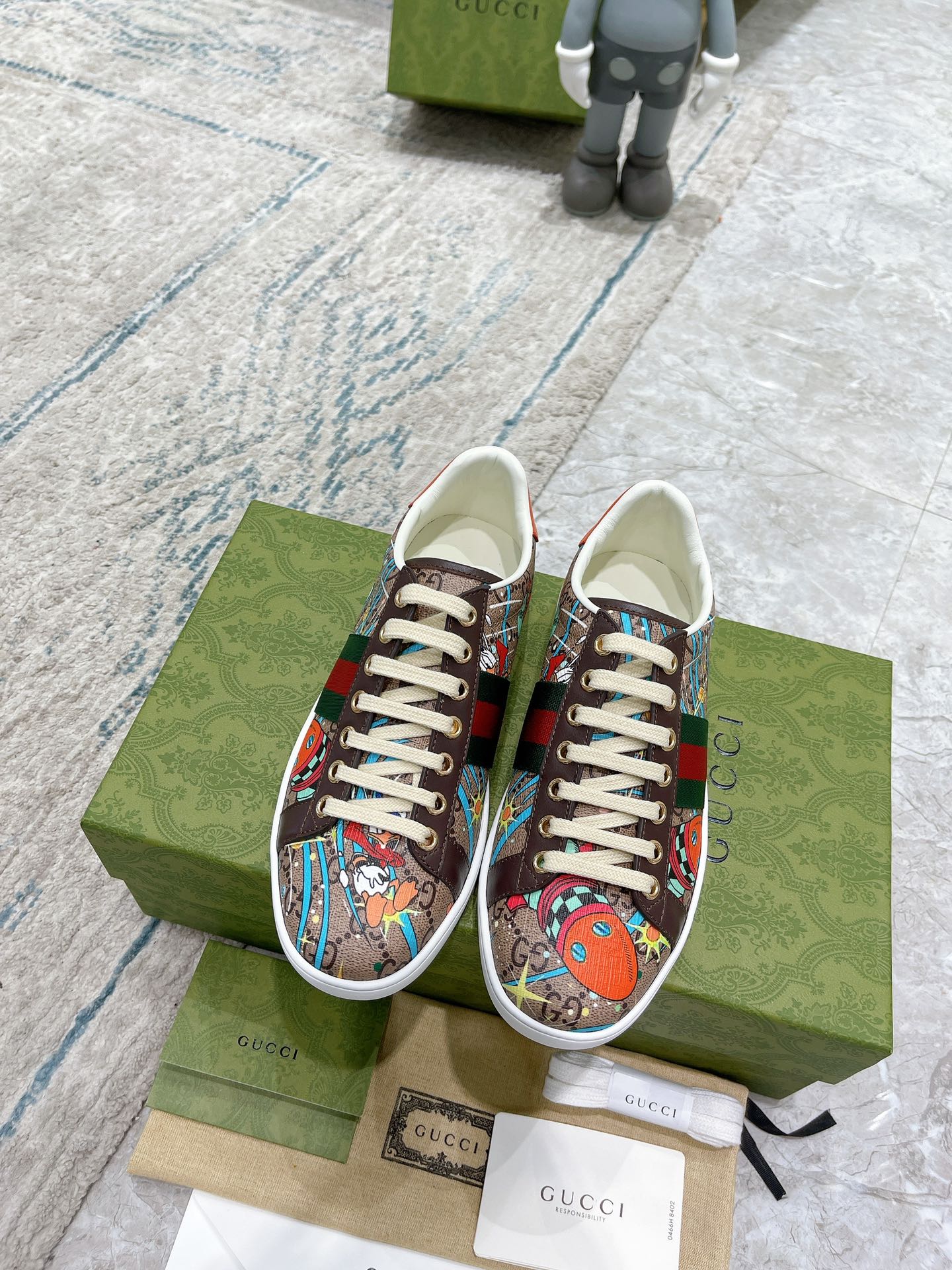 G*u*i sneakers