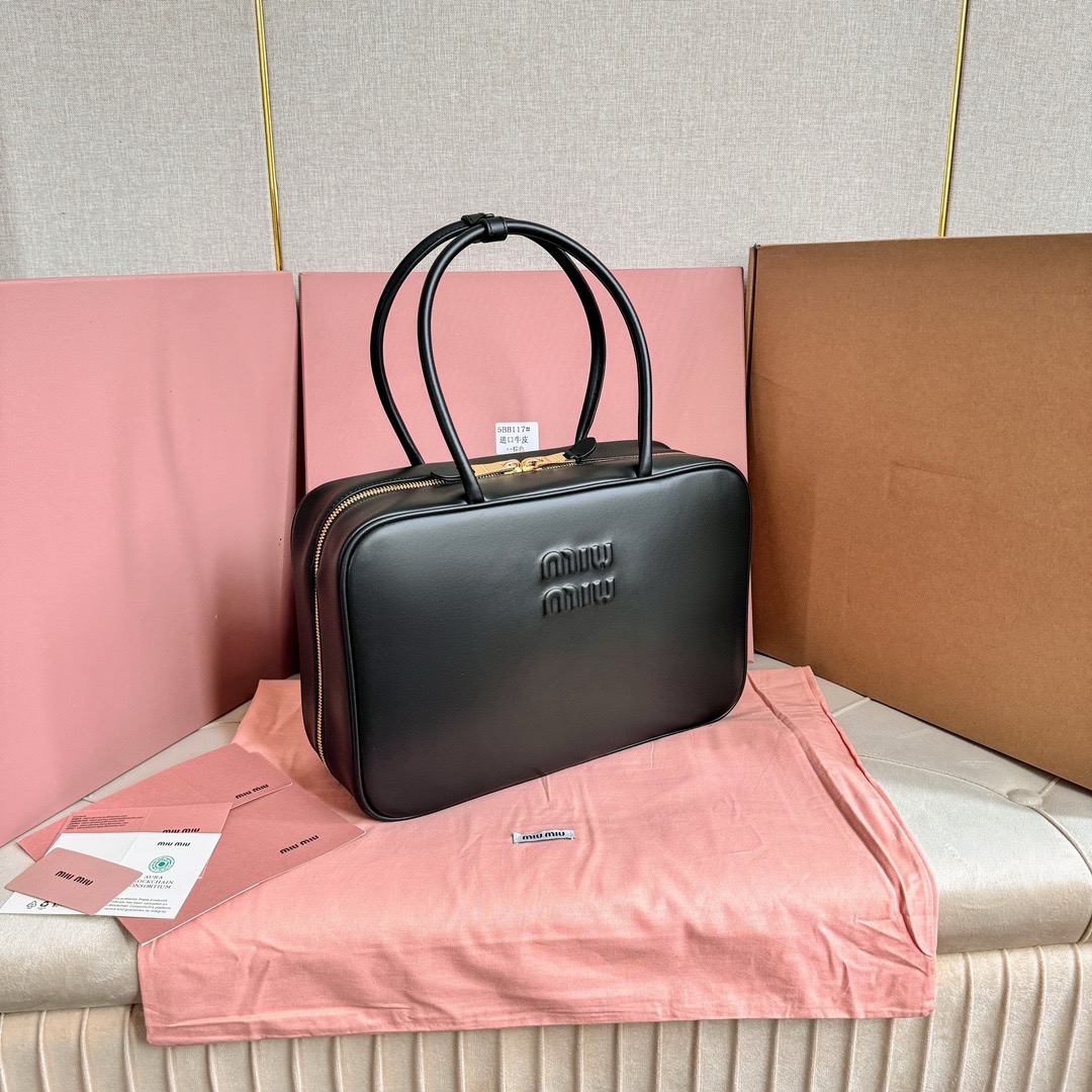 M*um*u leather top handbag-34x23x12cm