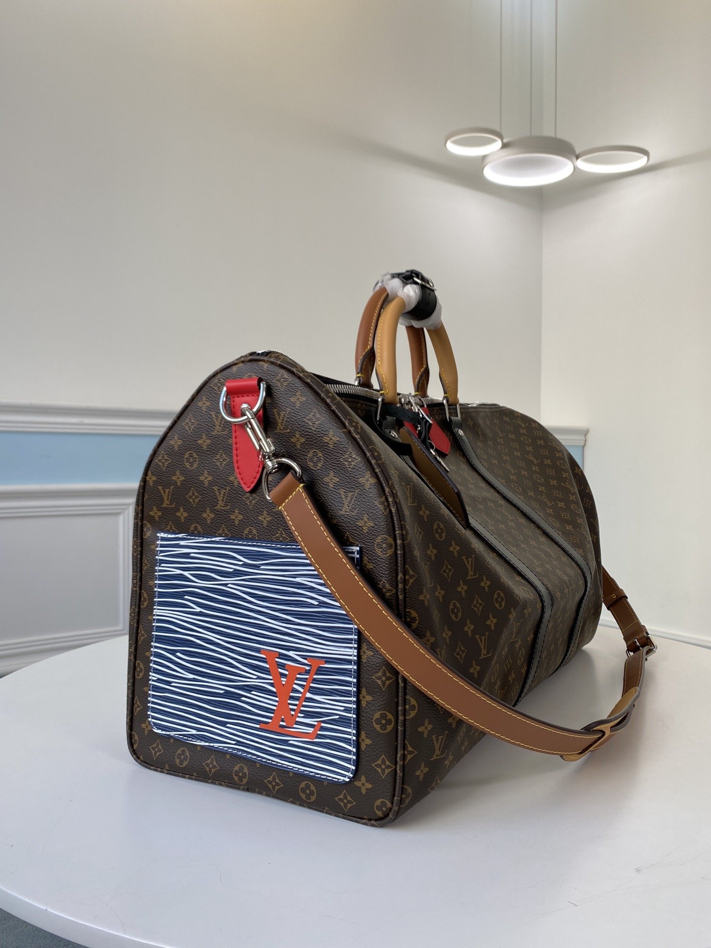 l0*is V*t0n keepall 50