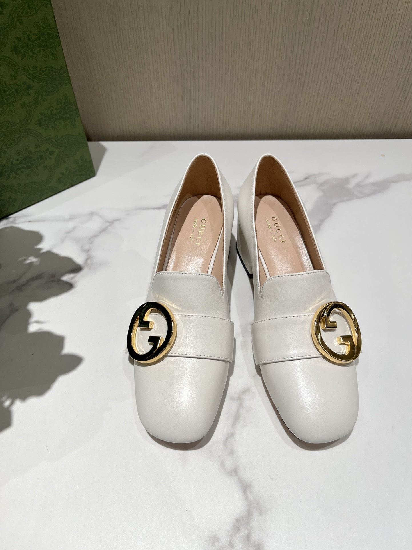 G*u*i loafers
