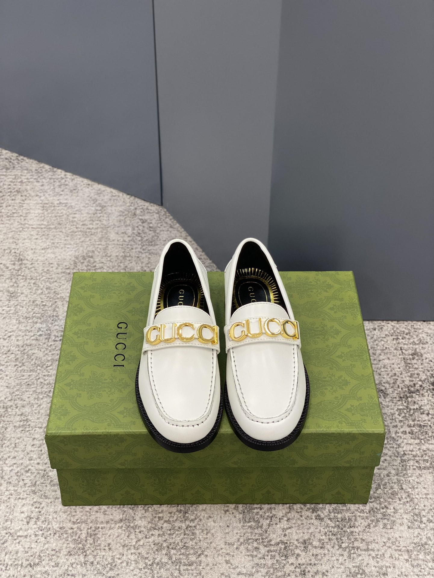 G*u*i loafers