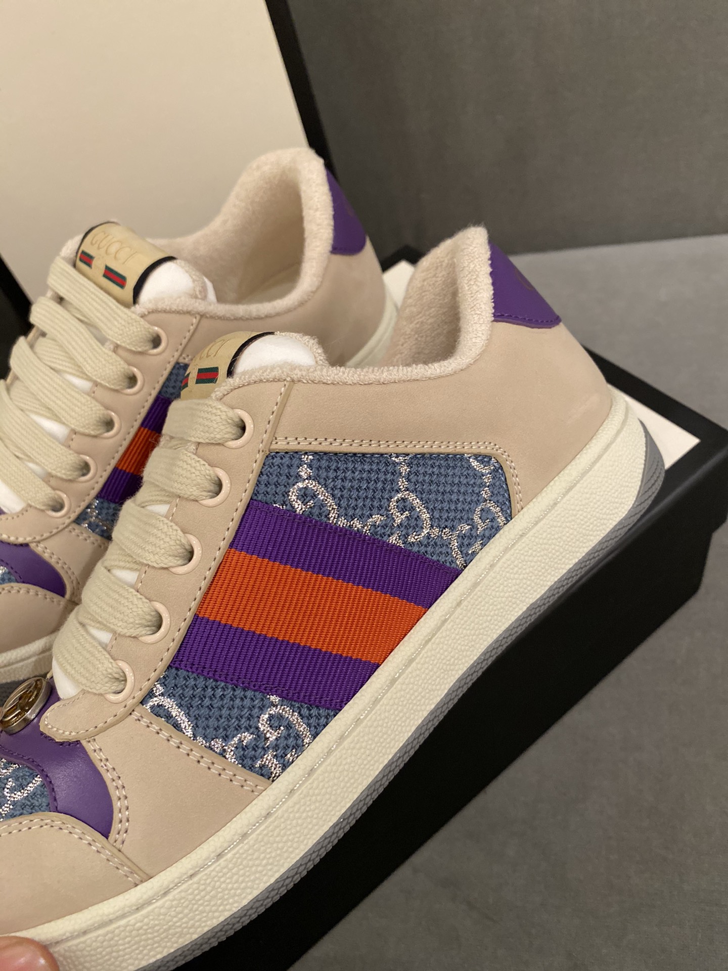 G*u*i sneakers