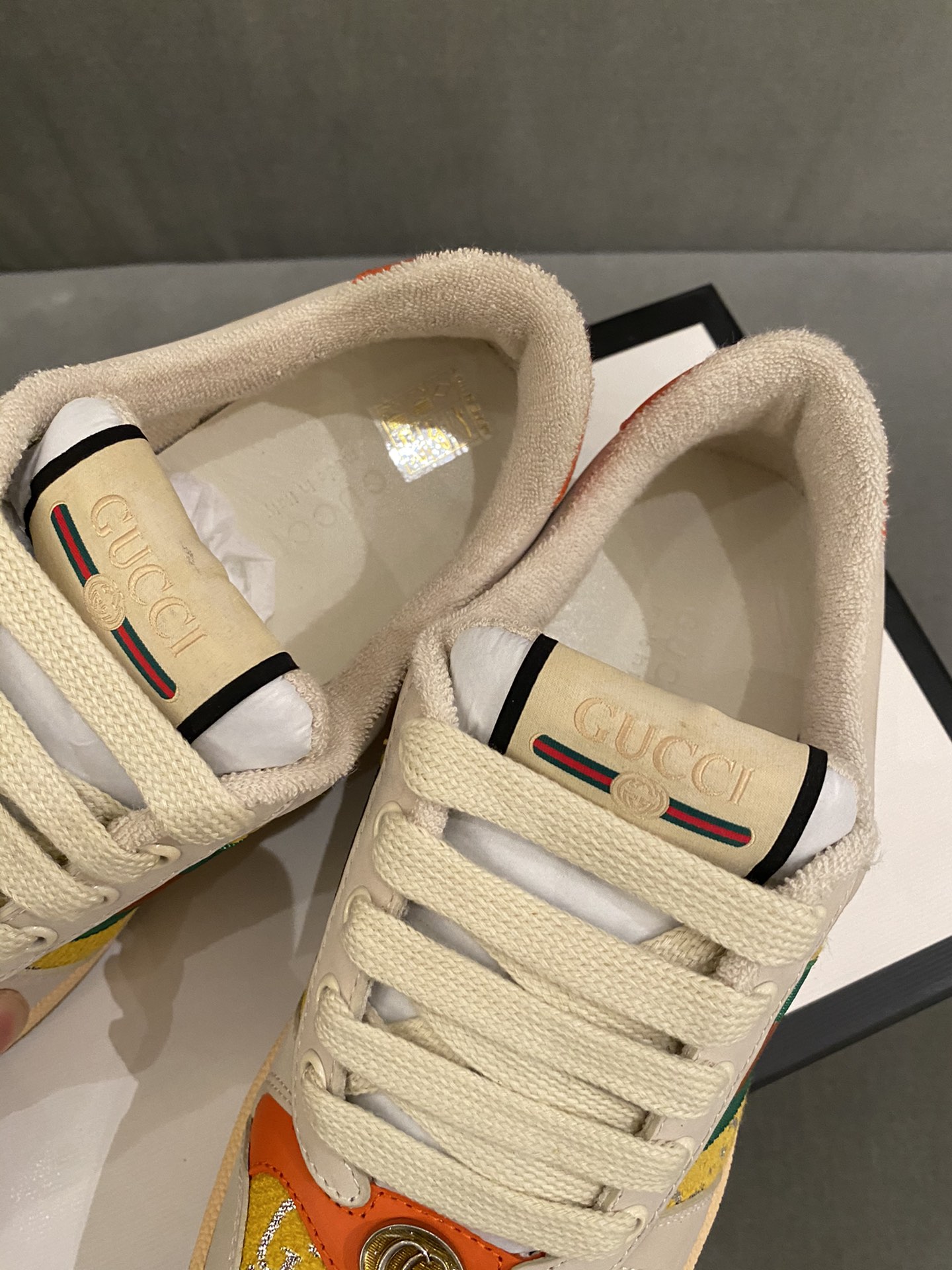 G*u*i sneakers