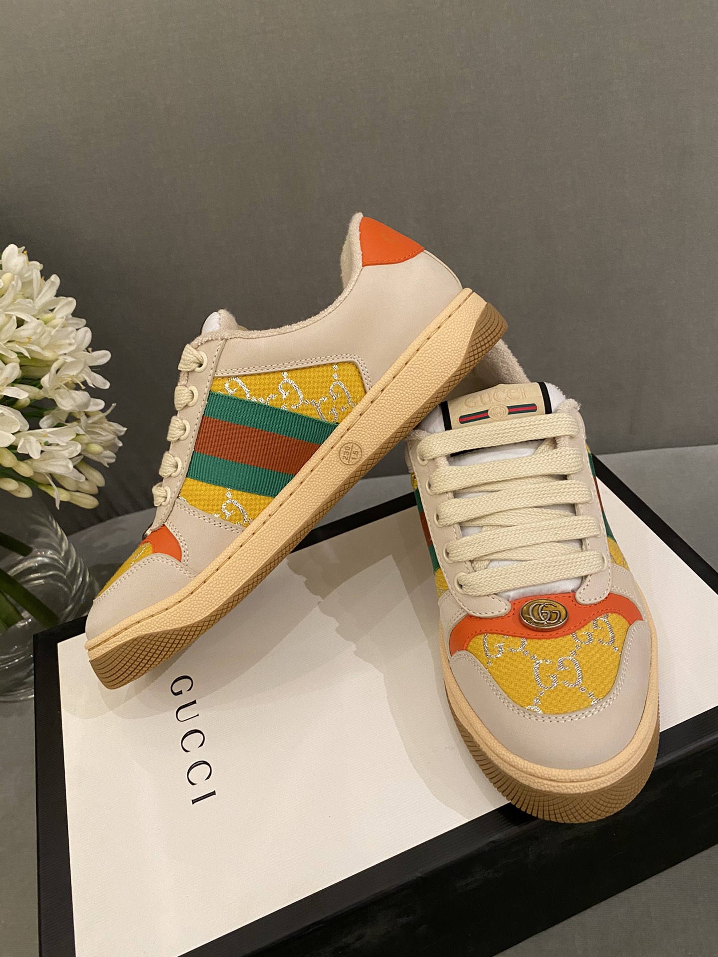 G*u*i sneakers
