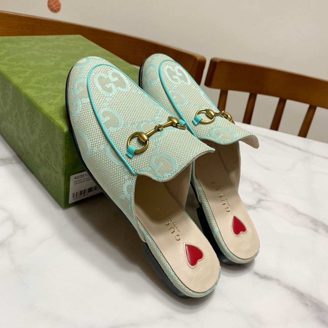 G*u*i loafers