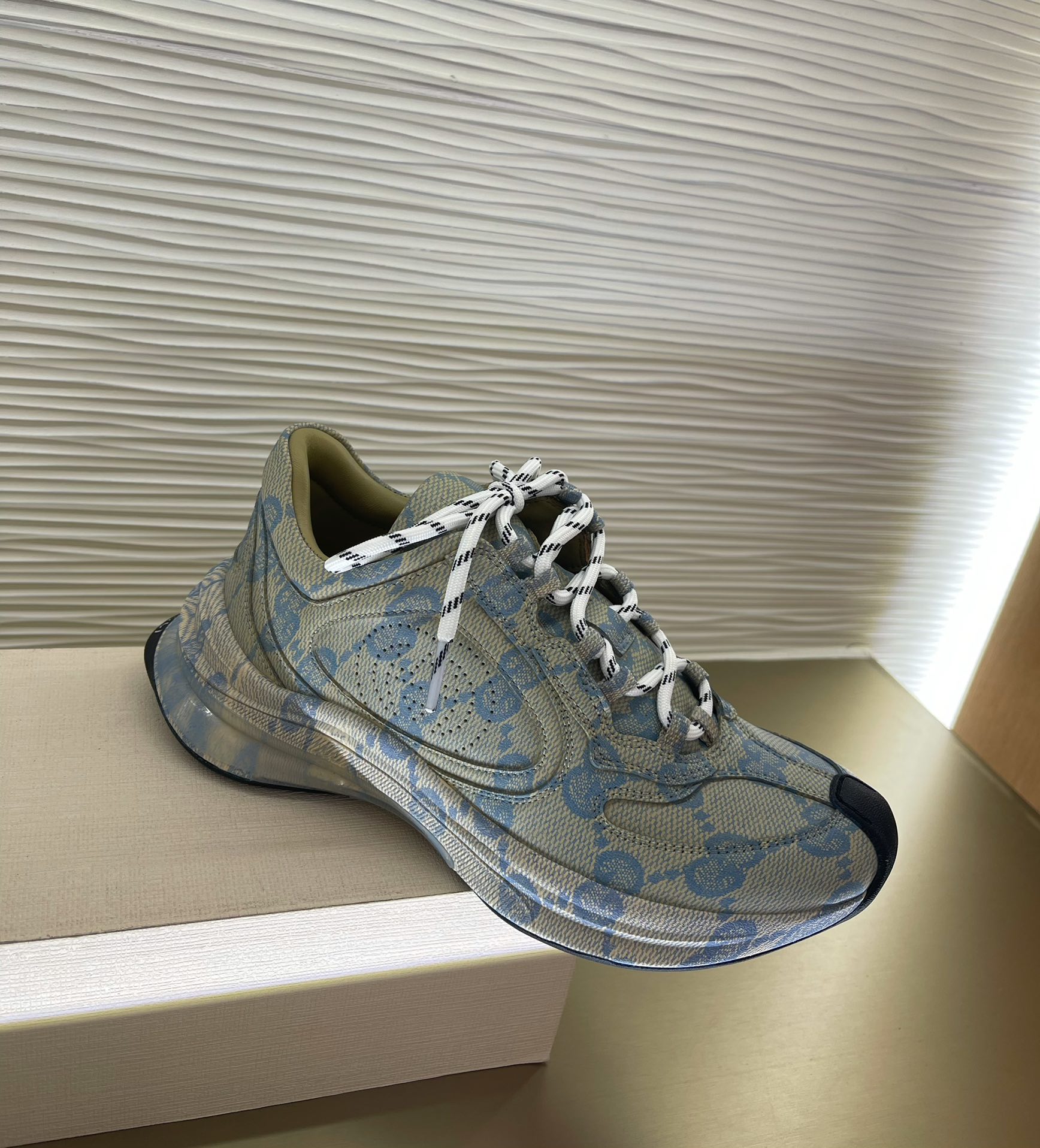 G*u*i sneakers
