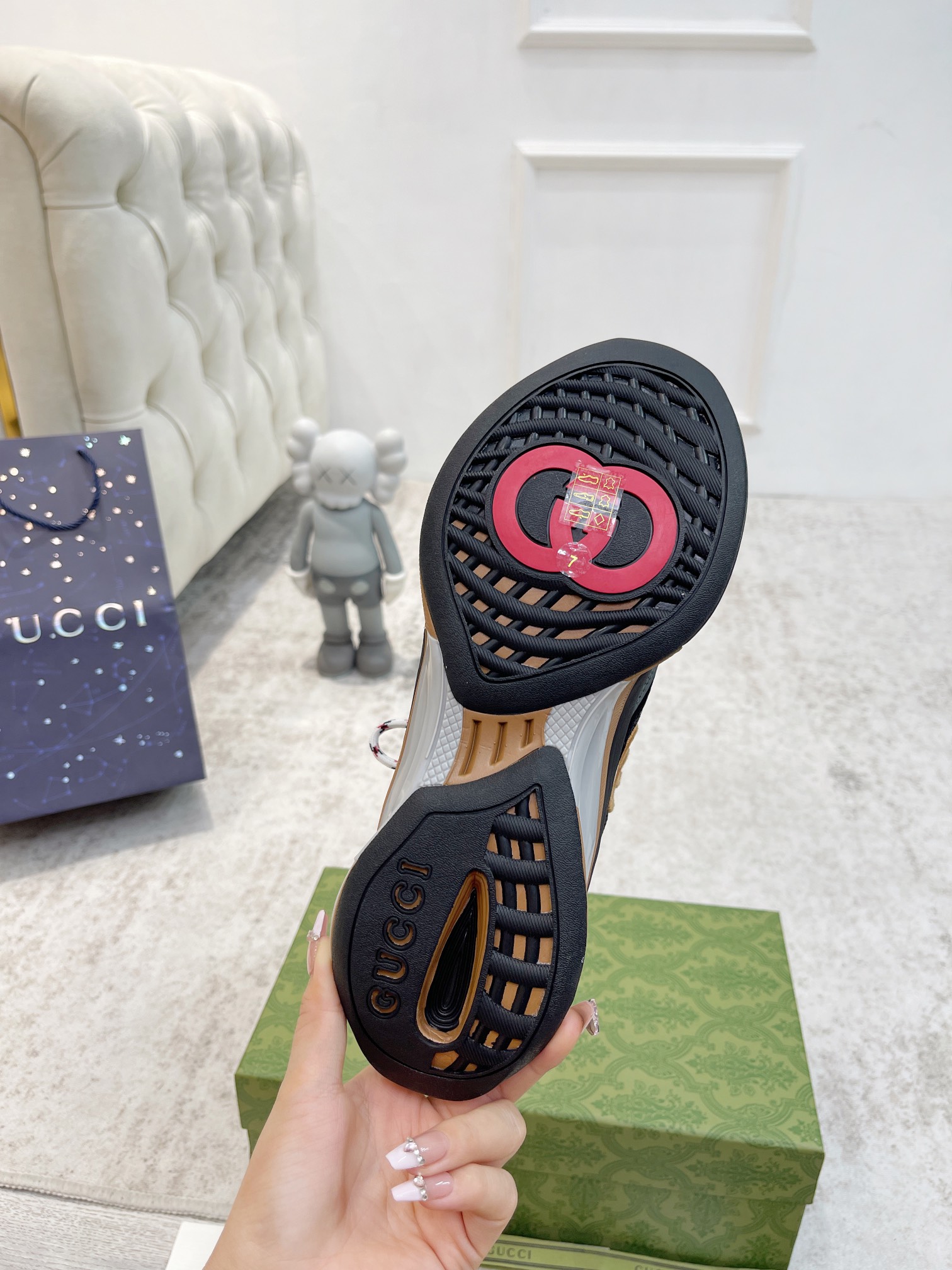 G*u*i sneakers