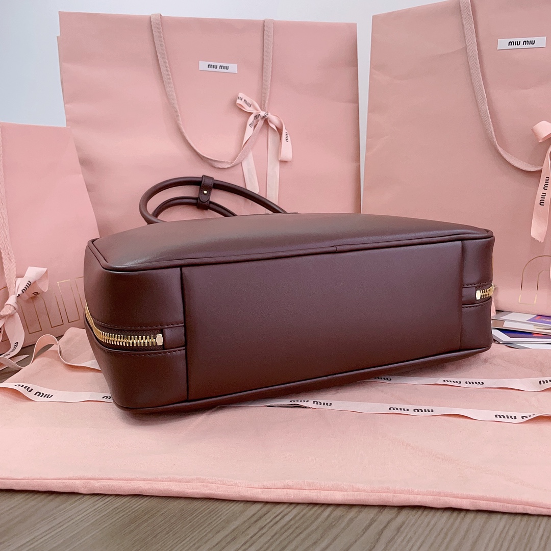 M*um*u leather top handbag-34x23x12cm