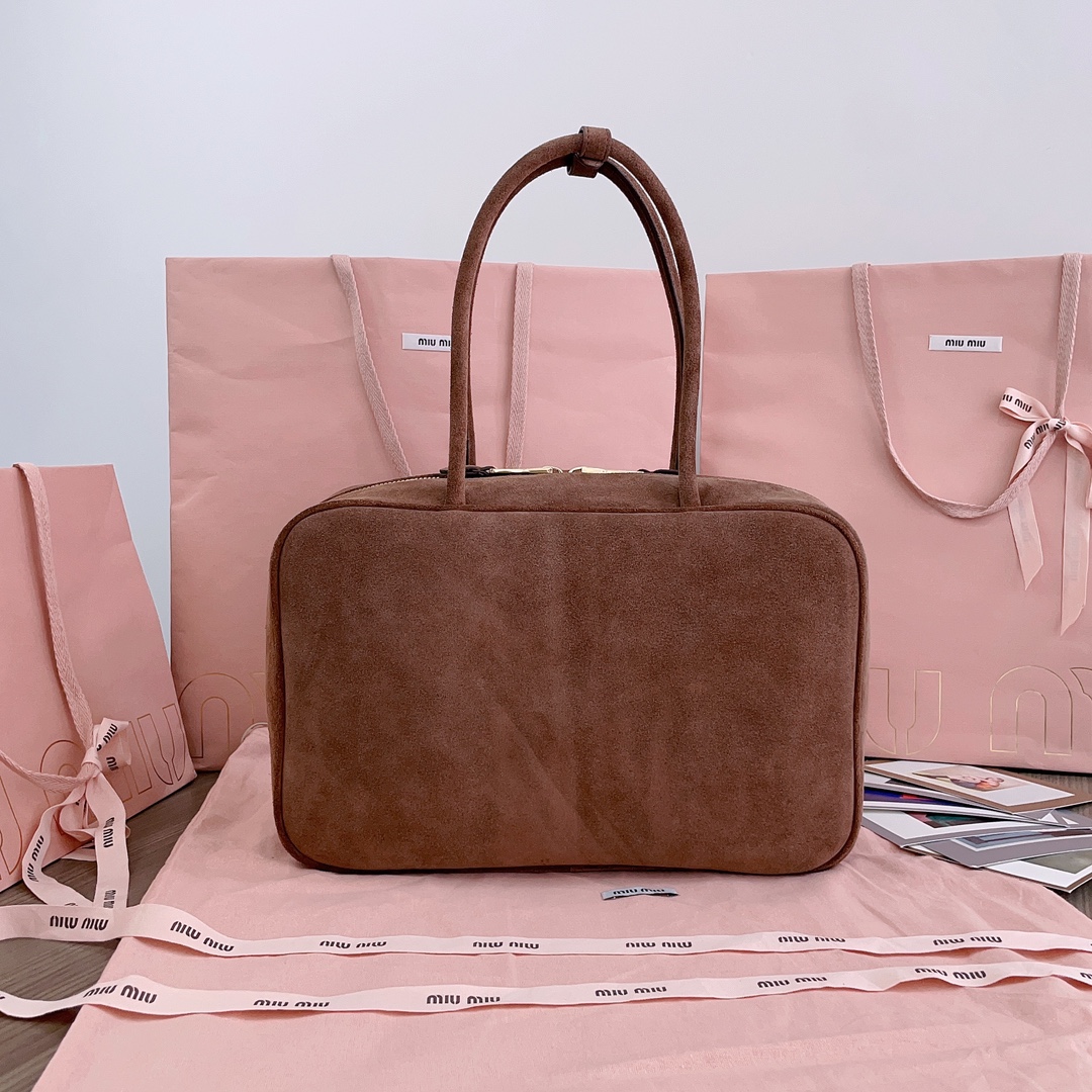 M*um*u leather top handbag-34x23x12cm