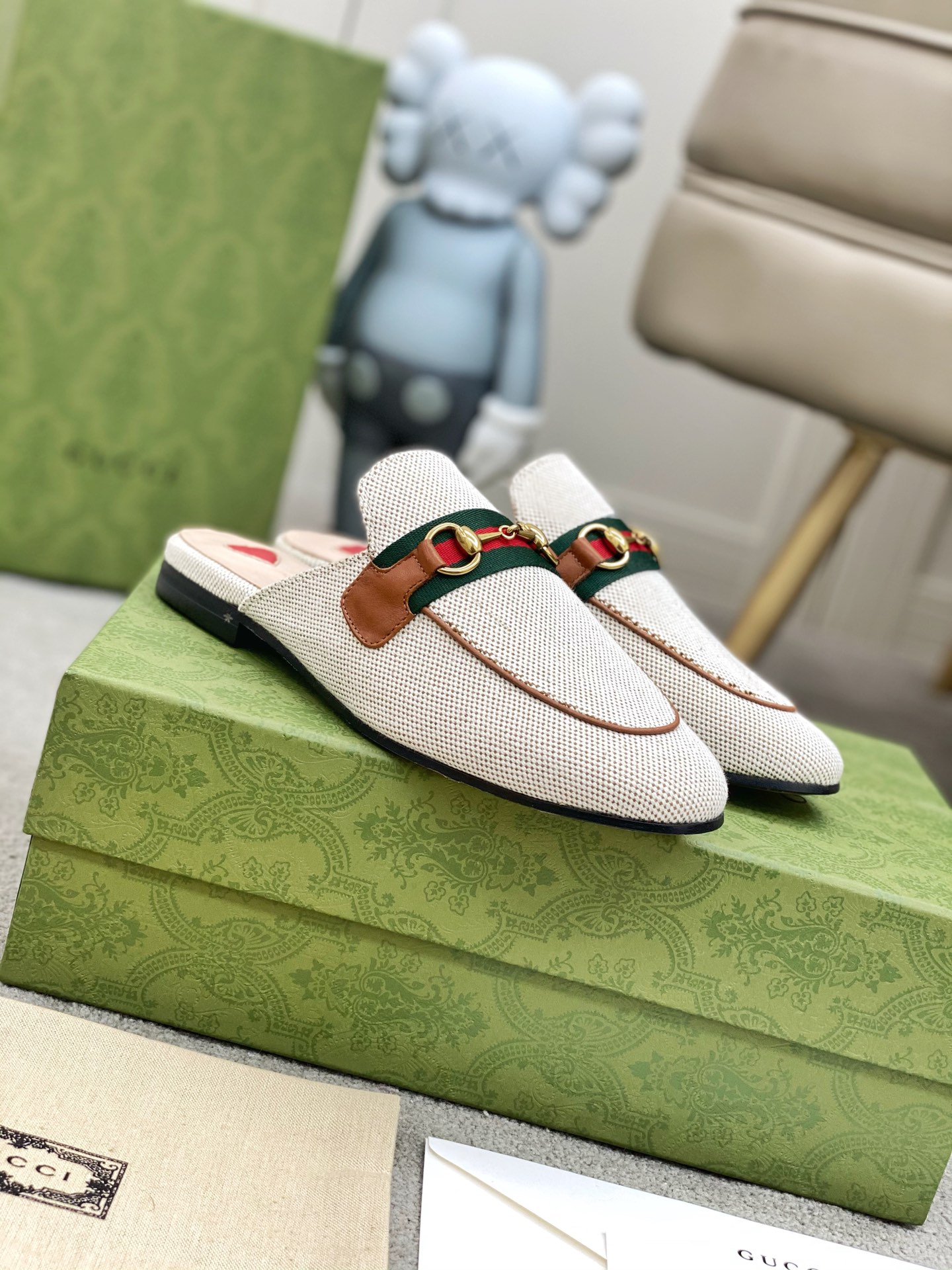 G*u*i loafers