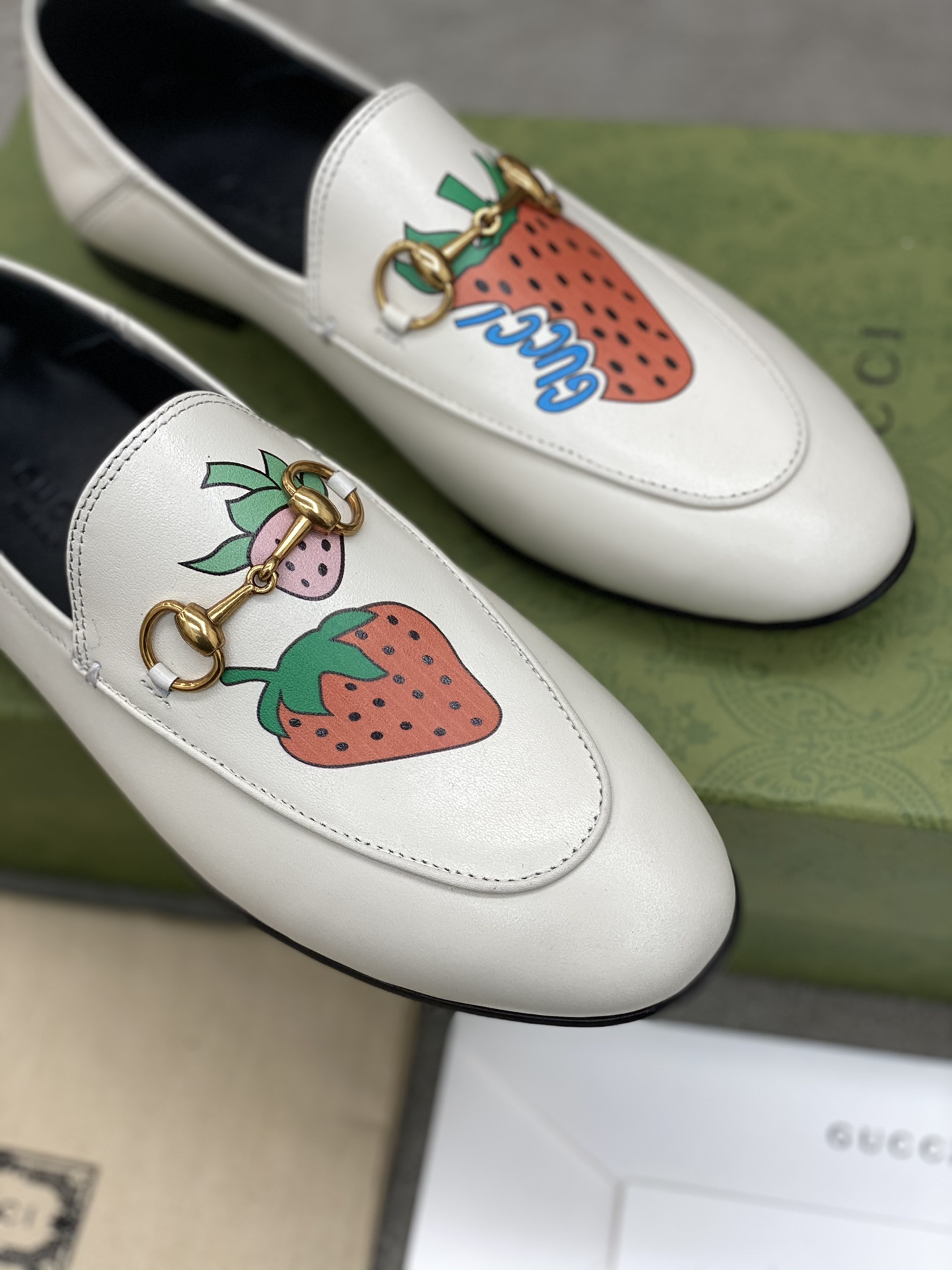 G*u*i loafers