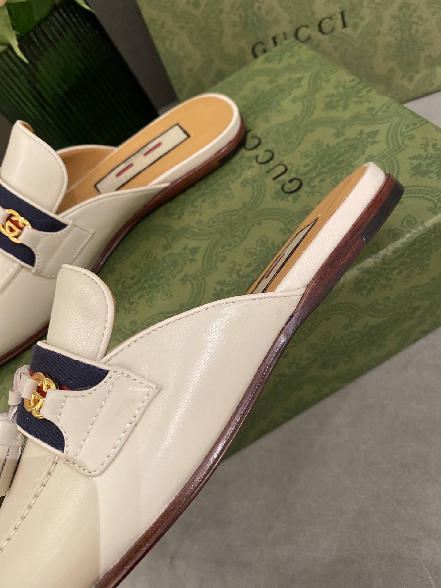 G*u*i loafers