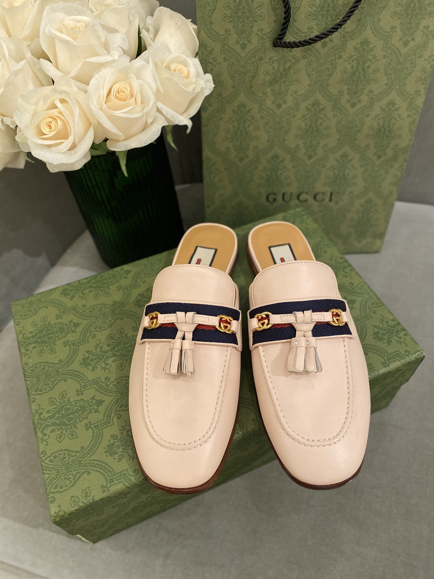 G*u*i loafers